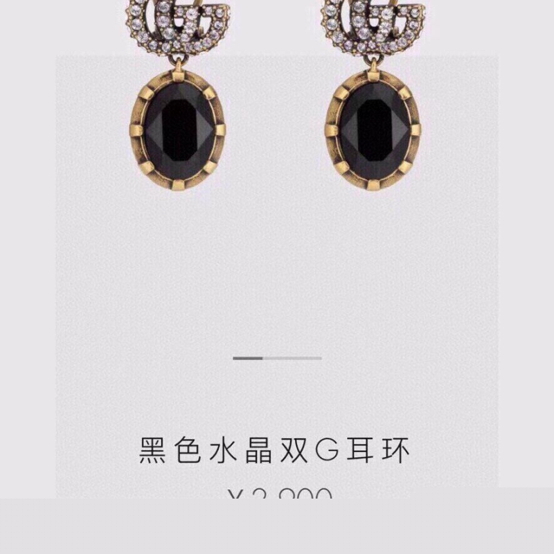 G*u*i earrings